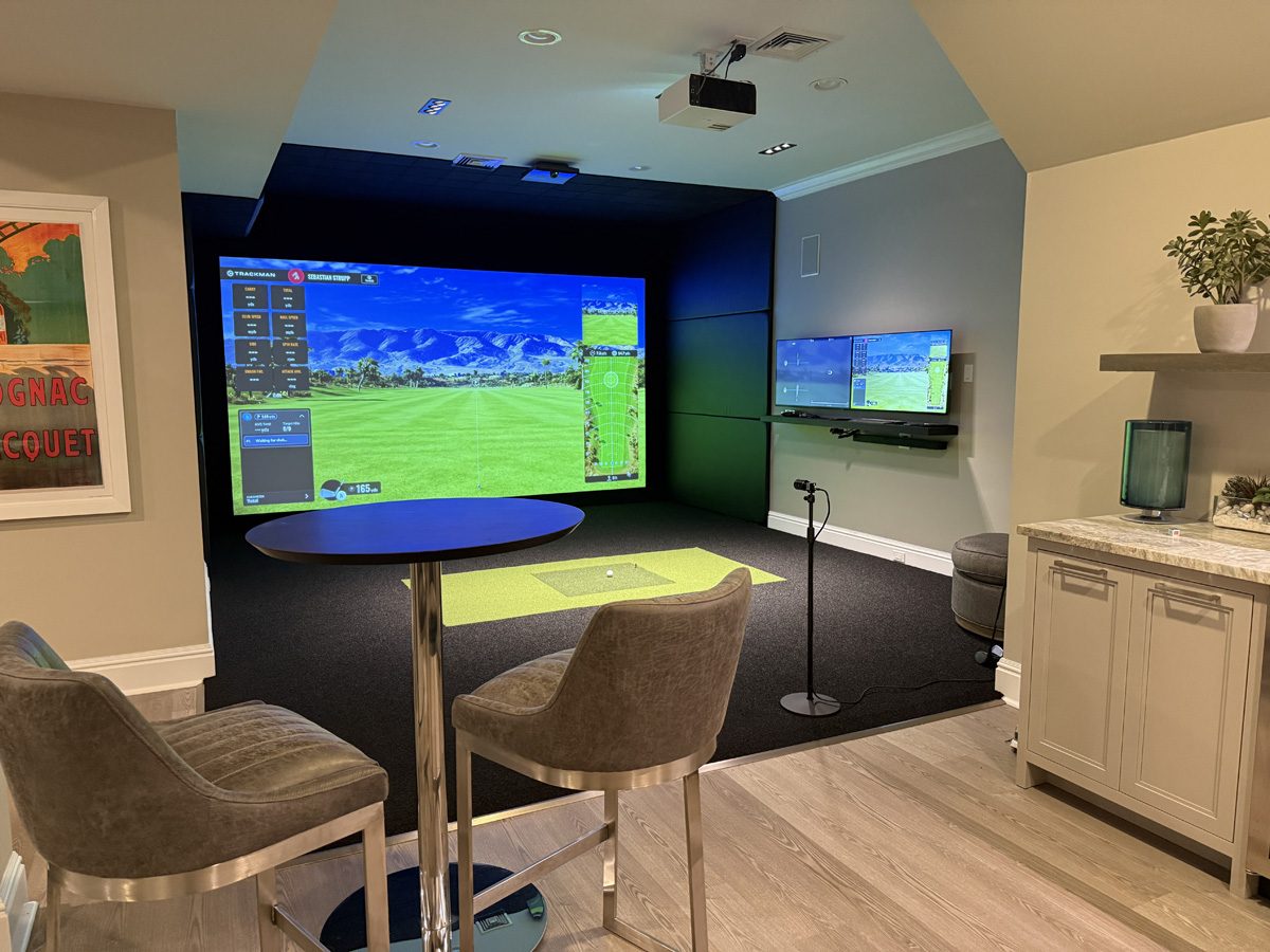 Finished golf simulator installation suitable for a premium commercial bay